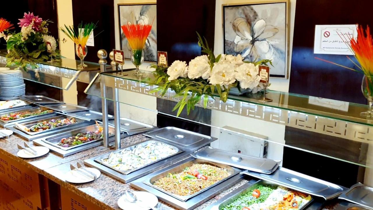 Jewel Sport City And Aqua Park Cairo Exterior photo A buffet at a hotel
