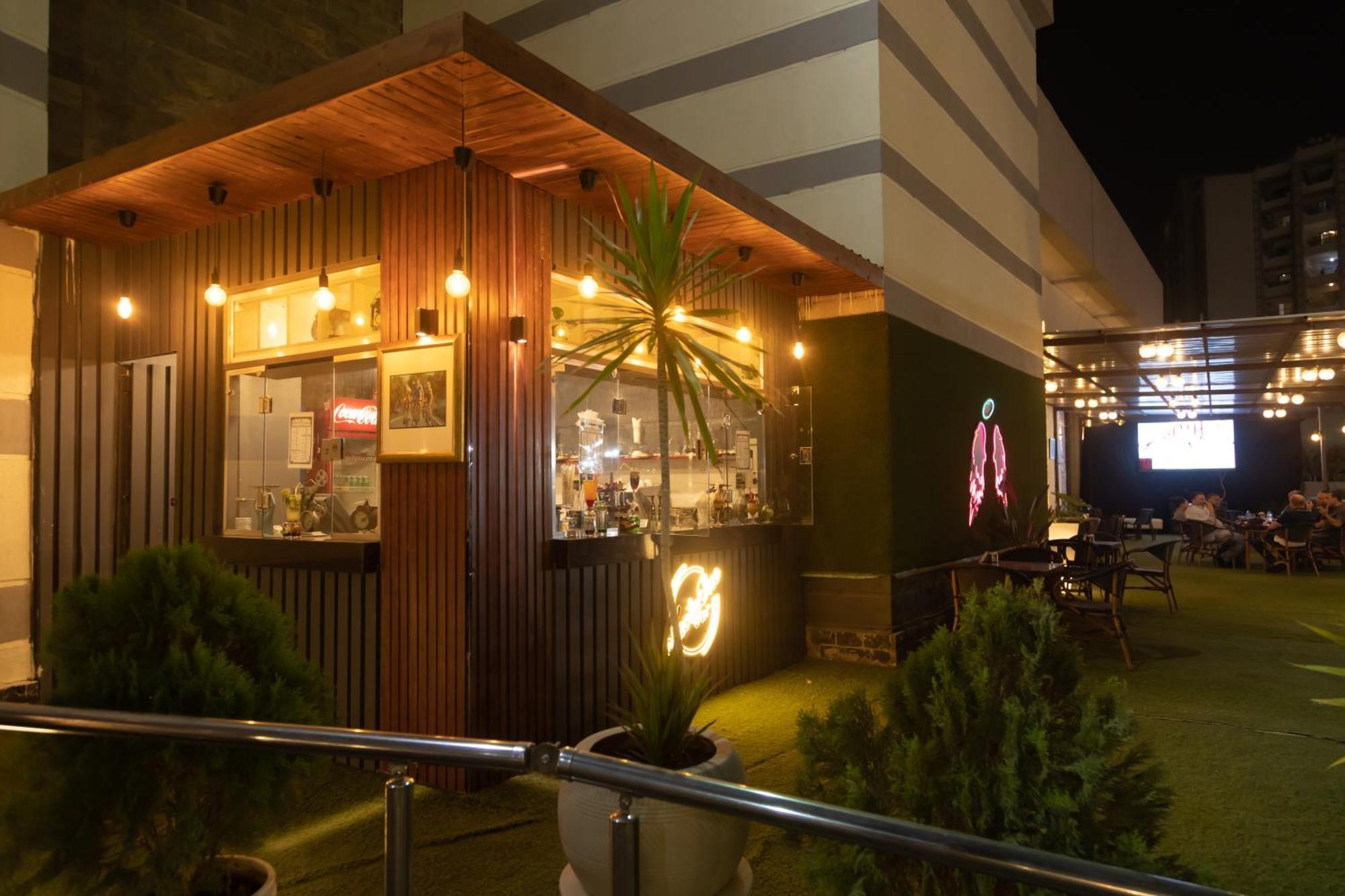 Jewel Sport City And Aqua Park Cairo Exterior photo The bar at the rooftop